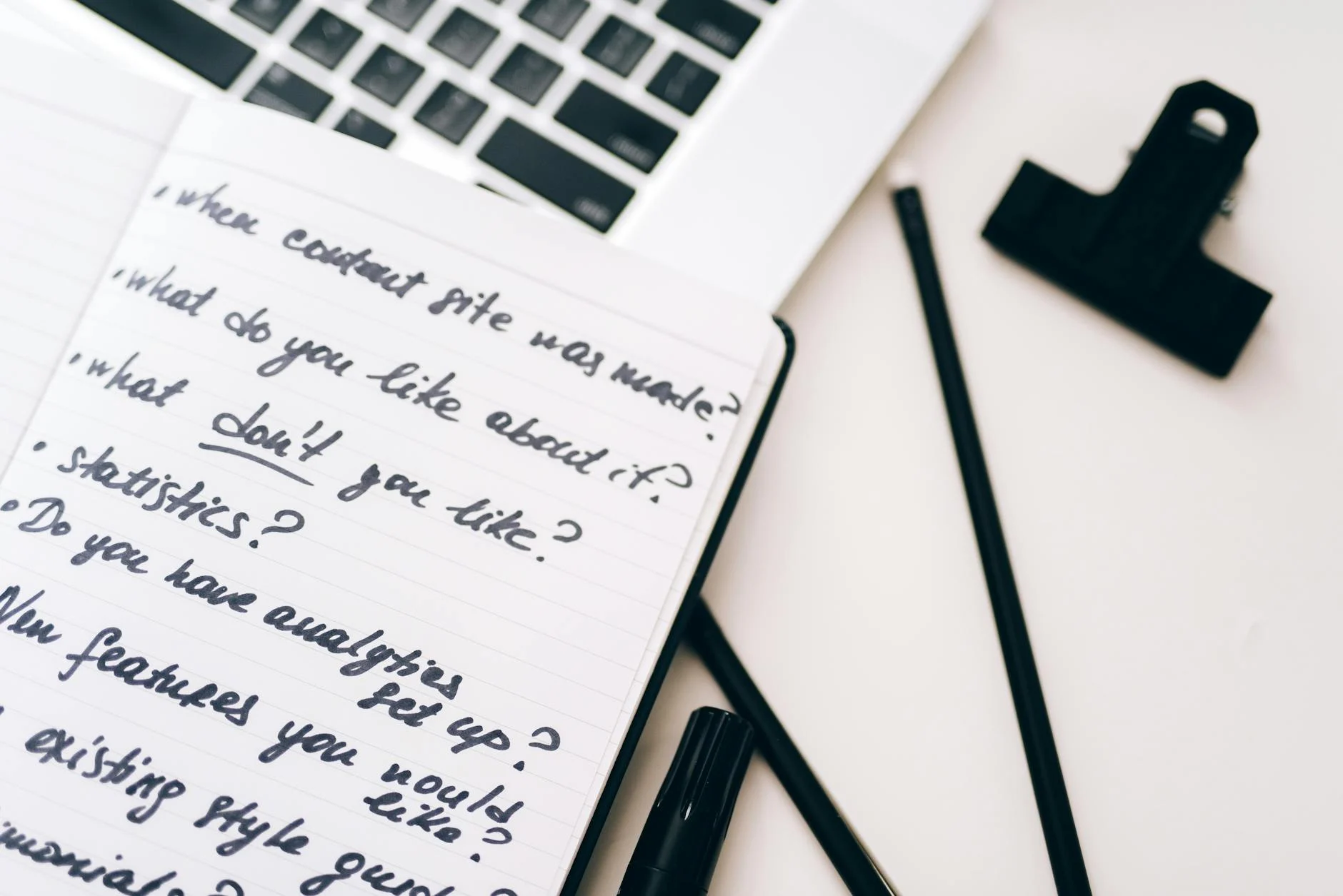 handwriting on a notebook on a table